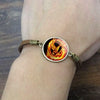 Hunger Games Glass Art Picture Leather Bracelet